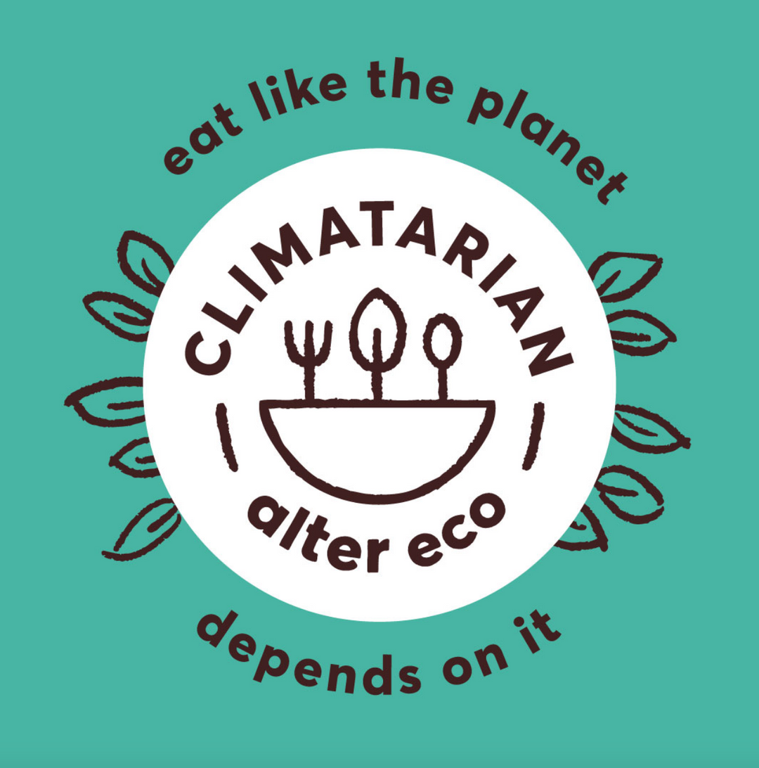 A badge that says Climatarian - Alter Eco. Eat like the planet depends on it.