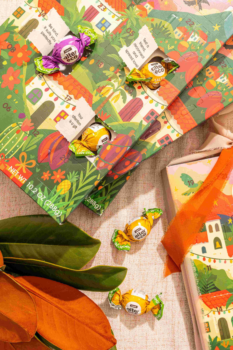 Candy packages with colorful designs on a textured surface